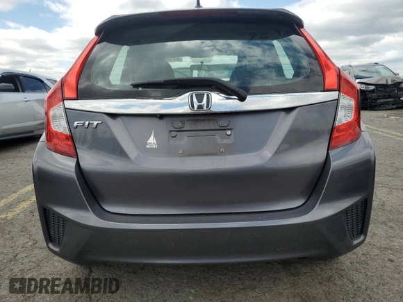 2015 Honda Fit EX-L z VIN 3HGGK5H8XFM776885, wystawiony jako Copart lot #57298225 z przebiegiem Nie podano mil oraz Szkoda całkowita • Salvage title. Historia ofert i sprzedaży dostępna na DreamBid. Obrazek 6.