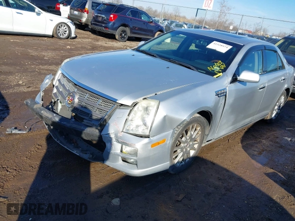 2010 Cadillac STS AWD with VIN 1G6DU6EV8A0120484, listed as a IAAI auction lot 41528974 with 89,489 mi miles and . Bid and sale history available at carsss.com. Image 2.
