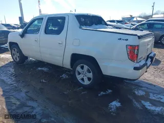2013 Honda Ridgeline RTL with VIN 5FPYK1F54DB015461, listed as a IAAI auction lot 41601818 with 107,211 mi miles. Bid and sale history available at carsss.com. Image 3.