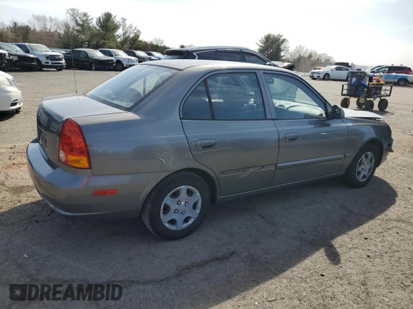 2005 Hyundai Accent GLS with VIN KMHCG45C65U625887, listed as a Copart auction lot 48824225 with 110,594 mi miles and Salvage Title. Bid and sale history available at carsss.com. Image 3.