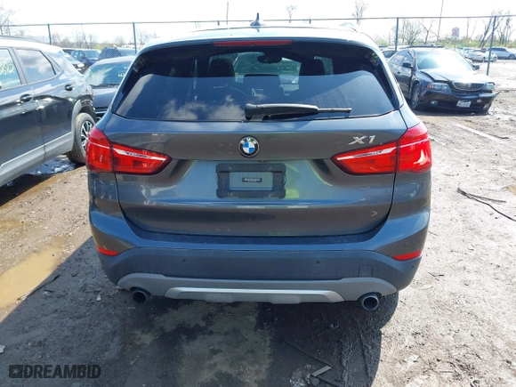 2016 BMW X1 xDrive28i with VIN WBXHT3C35GP886094, listed as a IAAI auction lot 42009639 with 61,739 mi miles. Bid and sale history available at carsss.com. Image 16.