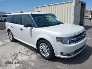 2015 Ford Flex SEL with VIN 2FMHK6C85FBA09233, listed as a IAAI auction lot 42142972 with 221,909 mi miles. Bid and sale history available at carsss.com. Image 1.
