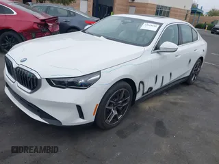 2024 BMW i5 eDrive40 with VIN WBY33FK03RCR99079, listed as a IAAI auction lot 42028540 with 28,827 mi miles and . Bid and sale history available at DreamBid. Image 21.