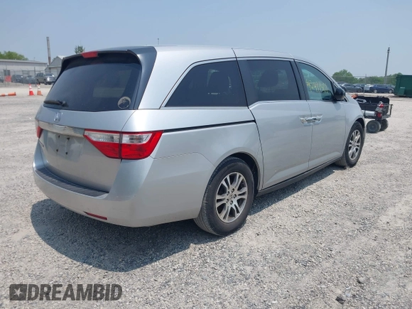 2012 Honda Odyssey EX z VIN 5FNRL5H44CB038825, wystawiony jako IAAI lot #42411401 z przebiegiem 214 164 mil mil oraz . Historia ofert i sprzedaży dostępna na DreamBid. Obrazek 4.
