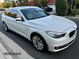 2016 BMW 5 Series 535i Gran Turismo with VIN WBA5M2C5XGG499062, listed as a Copart auction lot 64031055 with 98,650 mi miles and Salvage title. Bid and sale history available at DreamBid. Image 1.