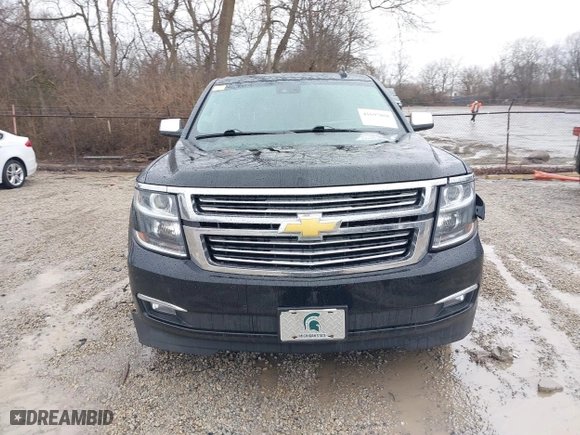 2016 Chevrolet Tahoe LTZ with VIN 1GNSKCKC2GR104305, listed as a IAAI auction lot 41697868 with 124,670 mi miles. Bid and sale history available at carsss.com. Image 12.