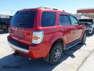 2008 Mercury Mariner Premier with VIN 4M2CU87188KJ52214, listed as a IAAI auction lot 41808878 with 131,953 mi miles. Bid and sale history available at carsss.com. Image 4.