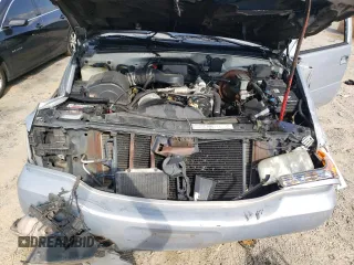 2000 GMC Denali z VIN 1GKEK13R2YR138523, wystawiony jako Copart lot #77609804 z przebiegiem 203 514 mil mil oraz Szkody całkowita. Historia ofert i sprzedaży dostępna na DreamBid. Obrazek 14.