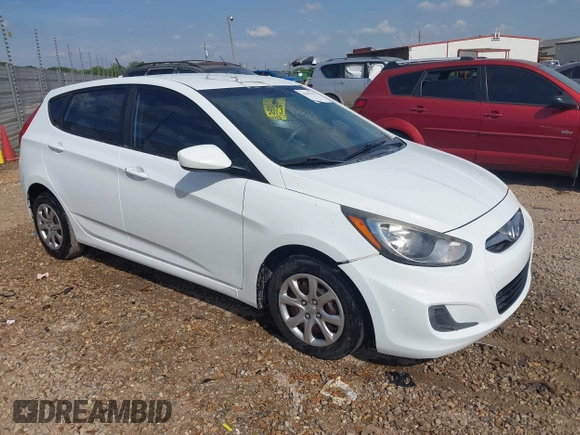 2014 Hyundai Accent GS with VIN KMHCT5AE6EU157751, listed as a IAAI auction lot 42161112 with 145,653 mi miles. Bid and sale history available at carsss.com. Image 1.
