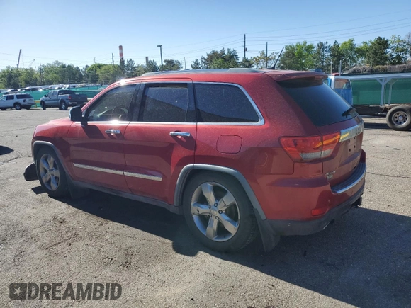 2011 Jeep Grand Cherokee Overland with VIN 1J4RR6GT8BC606688, listed as a Copart auction lot 57182295 with 100,423 mi miles and Salvage title. Bid and sale history available at DreamBid. Image 2.
