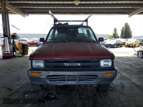 1991 Toyota Pickup with VIN JT4RN81A8M0064727, listed as a Copart auction lot 61271465 with 226,758 mi miles and Salvage title. Bid and sale history available at DreamBid. Image 5.