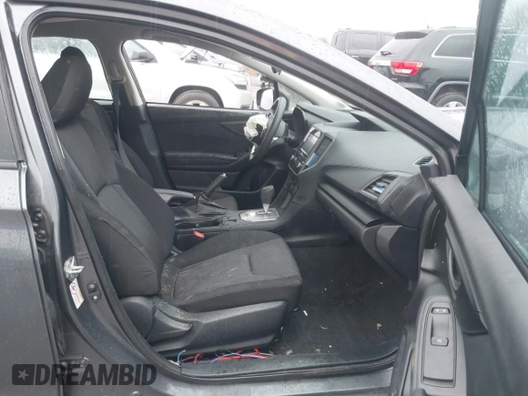 2018 Subaru Impreza with VIN 4S3GTAA67J3728185, listed as a IAAI auction lot 42140197 with 77,090 mi miles and . Bid and sale history available at DreamBid. Image 5.