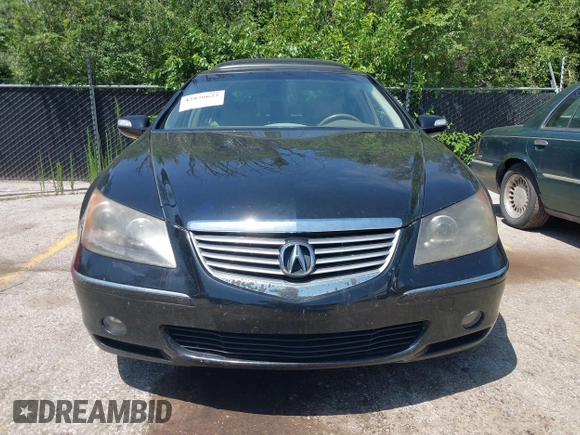 2005 Acura RL с VIN JH4KB16535C012806, выставлен на аукционе IAAI как лот 42876622 с пробегом 171 398 миль миль и . История ставок и продаж доступна на DreamBid. Изображение 6.