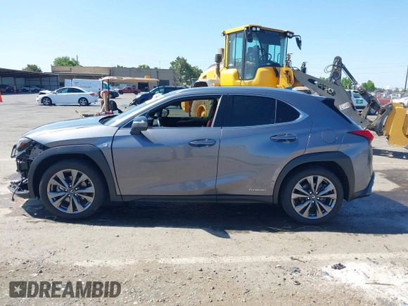 2021 Lexus UX 250h F Sport z VIN JTHR9JBH3M2052706, wystawiony jako IAAI lot #42321784 z przebiegiem 23 290 mil mil oraz . Historia ofert i sprzedaży dostępna na DreamBid. Obrazek 15.