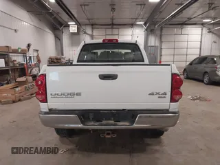 2007 Dodge 1500 SLT with VIN 1D7HU18297J631097, listed as a IAAI auction lot 41378054 with 169,263 mi miles and . Bid and sale history available at DreamBid. Image 16.