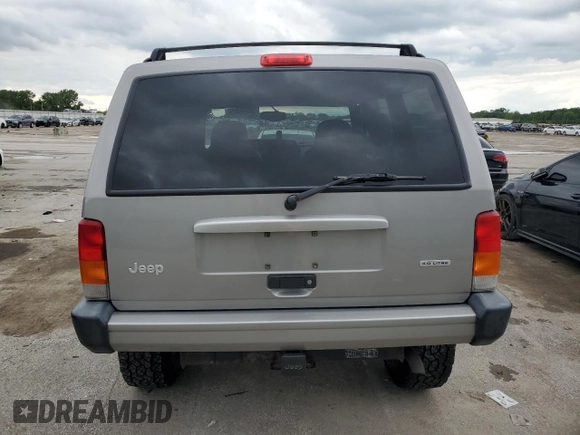 2001 Jeep Cherokee Sport with VIN 1J4FF48S91L592966, listed as a Copart auction lot 58996445 with 159,140 mi miles and Salvage title. Bid and sale history available at DreamBid. Image 6.