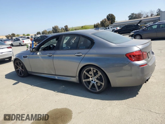 2014 BMW M5 z VIN WBSFV9C58ED593431, wystawiony jako Copart lot #54870555 z przebiegiem 172 191 mil mil oraz Szkoda całkowita • Salvage title. Historia ofert i sprzedaży dostępna na DreamBid. Obrazek 2.
