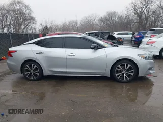 2018 Nissan Maxima SL z VIN 1N4AA6AP1JC394078, wystawiony jako IAAI lot #41197428 z przebiegiem 91 281 mil mil oraz . Historia ofert i sprzedaży dostępna na DreamBid. Obrazek 13.