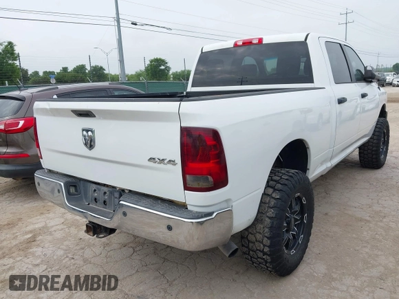 2014 Ram 2500 Tradesman with VIN 3C6UR5CLXEG253721, listed as a IAAI auction lot 42159395 with 157,904 mi miles and . Bid and sale history available at DreamBid. Image 4.