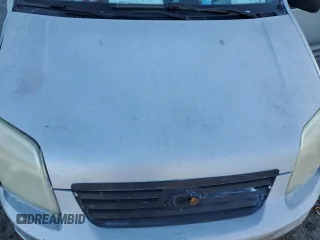 2010 Ford Transit Connect XLT с VIN NM0LS6BN3AT035244, выставлен на аукционе Copart как лот 81675084 с пробегом 148 874 миль миль и На запчасти • Non repairable. История ставок и продаж доступна на DreamBid. Изображение 12.
