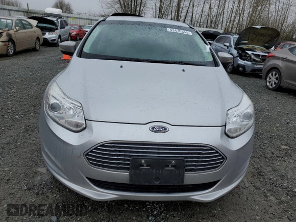 2013 Ford Focus Electric with VIN 1FADP3R43DL196997, listed as a Copart auction lot 43476355 with 77,071 mi miles and Salvage title. Bid and sale history available at DreamBid. Image 5.