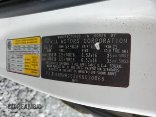 2006 Kia Sedona LX with VIN KNDMB233X66070866, listed as a Copart auction lot 71335794 with 242,416 mi miles and Salvage Title. Bid and sale history available at carsss.com. Image 14.