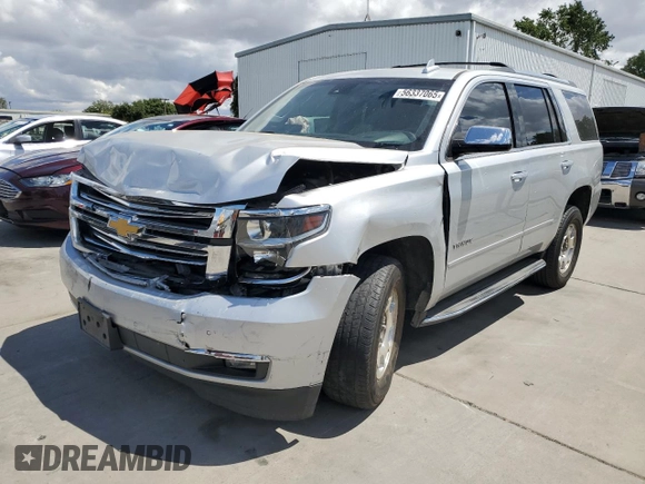 2017 Chevrolet Tahoe Premier with VIN 1GNSCCKC5HR212660, listed as a Copart auction lot 56337065 with 135,989 mi miles and Salvage title. Bid and sale history available at DreamBid. Image 1.