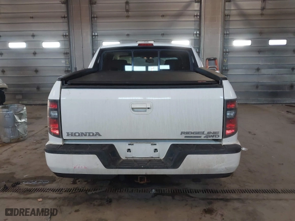 2014 Honda Ridgeline SE with VIN 5FPYK1F6XEB010582, listed as a IAAI auction lot 41641803 with 69,923 mi miles. Bid and sale history available at carsss.com. Image 16.