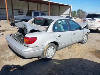 2000 Saturn SL z VIN 1G8ZH5282YZ226249, wystawiony jako IAAI lot #41381831 z przebiegiem 355 371 mil mil oraz . Historia ofert i sprzedaży dostępna na DreamBid. Obrazek 4.
