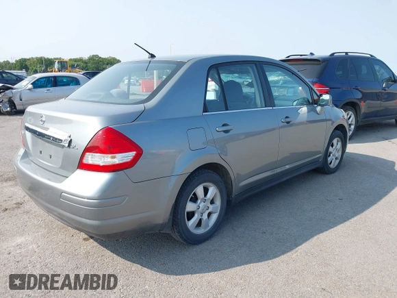 2007 Nissan Versa SL with VIN 3N1BC11E47L404371, listed as a IAAI auction lot 40309667 with 131,954 mi miles and . Bid and sale history available at DreamBid. Image 4.