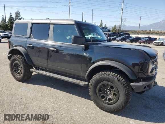 2024 Ford Bronco Wildtrak z VIN 1FMEE2BP1RLA54539, wystawiony jako Copart lot #46310905 z przebiegiem 12 545 mil mil oraz Szkody całkowita. Historia ofert i sprzedaży dostępna na DreamBid. Obrazek 4.