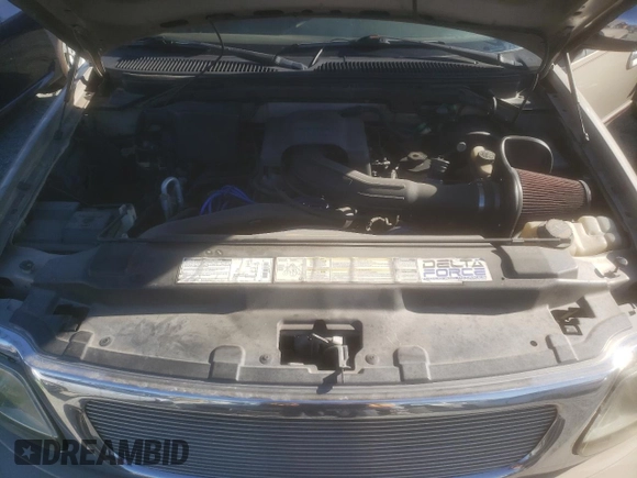 1997 Ford Expedition XLT with VIN 1FMEU1769VLC38411, listed as a Copart auction lot 50315135 with 230,863 mi miles and Salvage title. Bid and sale history available at DreamBid. Image 12.