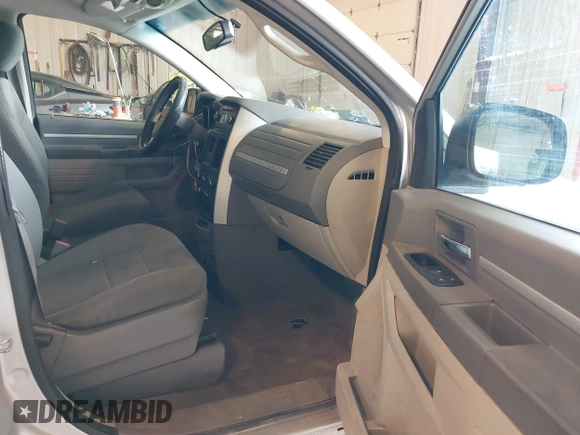 2010 Dodge Grand Caravan SE with VIN 2D4RN4DE8AR173359, listed as a IAAI auction lot 42170689 with 246,553 mi miles and . Bid and sale history available at DreamBid. Image 5.
