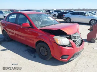 2011 Kia Rio LX with VIN KNADH4A34B6848891, listed as a IAAI auction lot 41678155 with 152,021 mi miles. Bid and sale history available at carsss.com. Image 1.