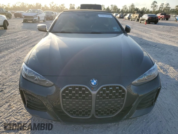 2024 BMW 4 Series M440i with VIN WBA53AT05RCP27562, listed as a Copart auction lot 77213334 with Not Provided miles and Salvage Title. Bid and sale history available at carsss.com. Image 5.