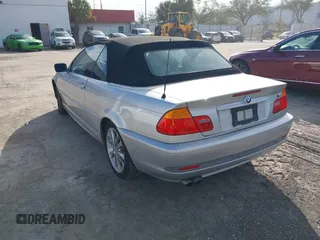 2004 BMW 3 Series 330Ci with VIN WBABW534X4PL45274, listed as a IAAI auction lot 41437124 with 124,001 mi miles. Bid and sale history available at carsss.com. Image 3.