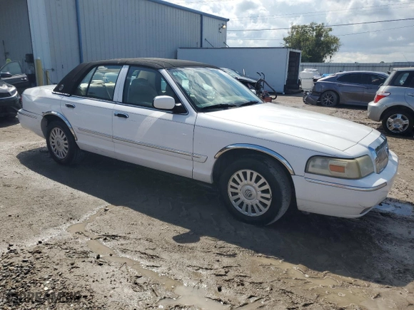 2007 Mercury Grand Marquis LS with VIN 2MEFM75WX7X604153, listed as a Copart auction lot 71976844 with 97,614 mi miles and Salvage Title. Bid and sale history available at carsss.com. Image 4.