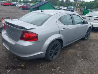2014 Dodge Avenger SE with VIN 1C3CDZAB5EN149248, listed as a IAAI auction lot 42524423 with 120,974 mi miles and . Bid and sale history available at DreamBid. Image 4.
