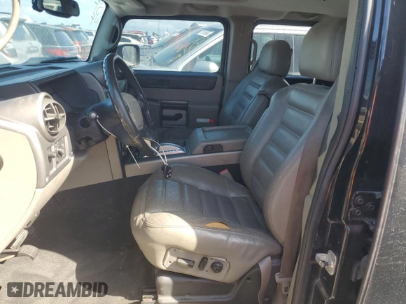 2003 Hummer H2 with VIN 5GRGN23U33H114427, listed as a Copart auction lot 76528834 with 133,571 mi miles and Salvage Title. Bid and sale history available at carsss.com. Image 7.