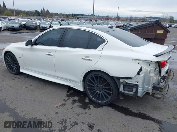 2014 Infiniti Q50 Premium z VIN JN1BV7AP8EM671403, wystawiony jako IAAI lot #41837716 z przebiegiem 115 058 mil mil oraz . Historia ofert i sprzedaży dostępna na DreamBid. Obrazek 3.