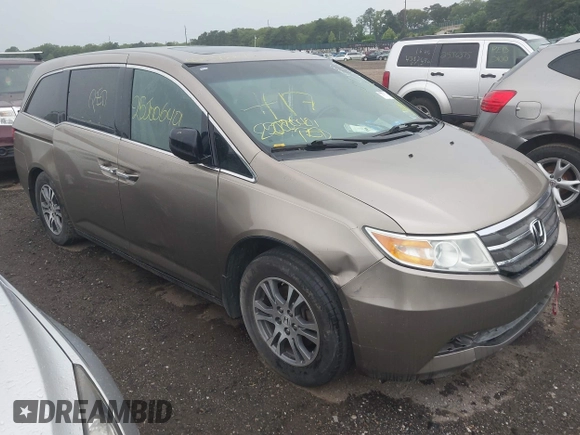 2011 Honda Odyssey EX-L with VIN 5FNRL5H68BB054204, listed as a IAAI auction lot 42576248 with Not provided miles and . Bid and sale history available at DreamBid. Image 1.