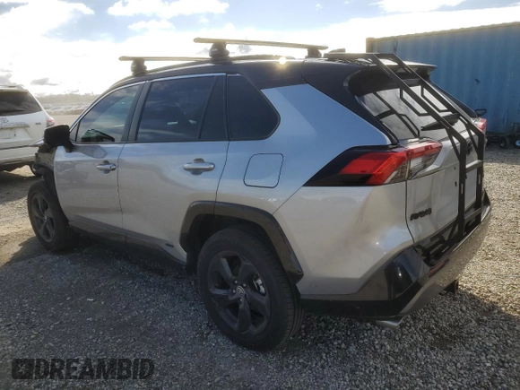 2021 Toyota RAV4 Hybrid XSE with VIN 4T3E6RFV1MU057403, listed as a Copart auction lot 47809415 with 56,570 mi miles and Salvage Title. Bid and sale history available at carsss.com. Image 2.