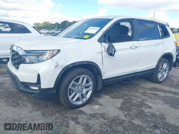 2025 Honda Passport EX-L z VIN 5FNYF8H52SB001266, wystawiony jako IAAI lot #41655256 z przebiegiem 5 622 mil mil oraz . Historia ofert i sprzedaży dostępna na DreamBid. Obrazek 18.