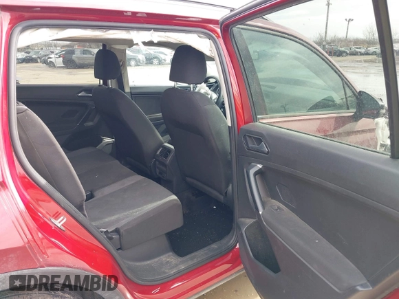 2018 Volkswagen Tiguan S with VIN 3VV1B7AX9JM085312, listed as a IAAI auction lot 41656827 with 122,322 mi miles and . Bid and sale history available at DreamBid. Image 8.