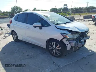 2017 Honda Fit EX-L z VIN JHMGK5H84HS013316, wystawiony jako IAAI lot #42157698 z przebiegiem 67 104 mil mil oraz . Historia ofert i sprzedaży dostępna na DreamBid. Obrazek 1.