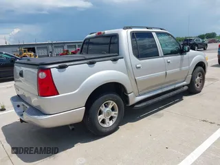2004 Ford Explorer Sport Trac XLS z VIN 1FMZU77K64UA98358, wystawiony jako IAAI lot #42637743 z przebiegiem 158 359 mil mil oraz . Historia ofert i sprzedaży dostępna na DreamBid. Obrazek 4.