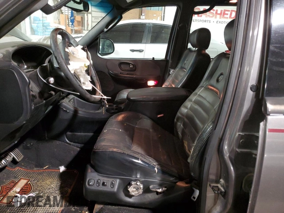 2002 Ford F-150 Harley Davidson with VIN 1FTRW07392KE05237, listed as a Copart auction lot 87451334 with 175,986 mi miles and Salvage Title. Bid and sale history available at carsss.com. Image 7.