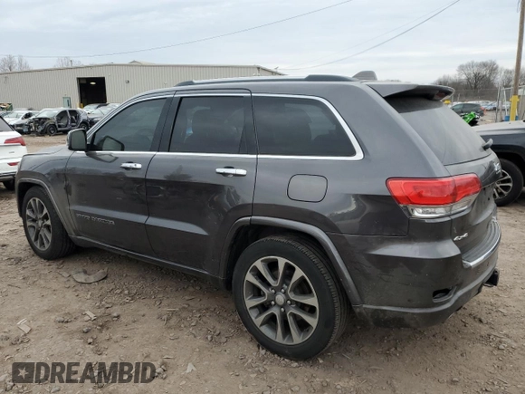 2017 Jeep Grand Cherokee Overland with VIN 1C4RJFCT5HC874593, listed as a Copart auction lot 46770205 with 72,744 mi miles and Salvage Title. Bid and sale history available at carsss.com. Image 2.