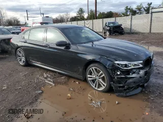 2017 BMW 7 Series ALPINA B7 xDrive with VIN WBA7F2C57HG421617, listed as a Copart auction lot 85318774 with 73,502 mi miles and Salvage title. Bid and sale history available at DreamBid. Image 4.