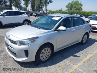 2018 Kia Rio LX with VIN 3KPA24AB4JE086105, listed as a IAAI auction lot 42062323 with 128,289 mi miles. Bid and sale history available at carsss.com. Image 18.
